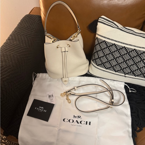Coach Handbags - Coach Cream Pebbled Leather Drawstring Crossbody Bag